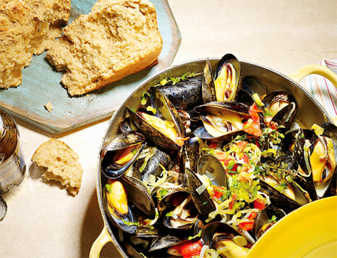 <b>INGREDIENTS</b> 900g mussels, debearded 1 tbs vegetable oil 1 leek, thinly sliced 3 garlic cloves, thinly sliced 3 medium-size tomatoes, seeded and diced 1 tbs fresh thyme 1 tbs butter ¼ tsp red chilli flakes 2 cups low-hops amber ale or wheat beer Juice of ½ lemon ⅓ cup chopped flat-leaf parsley <b>METHOD</b>1 Rinse mussels. Throw out any that are broken or open when tapped. 2 In a large saucepan, heat oil over medium heat. Add leek and garlic; cook for four minutes. Add tomatoes, thyme, butter, red chilli flakes and beer. Bring to a boil, add mussels, cover and simmer until mussels have opened, about three to four minutes. 3 Using a slotted spoon, transfer mussels and vegetables to four bowls. Add lemon juice and salt and pepper to taste to the pan and return contents to a boil. Simmer until the liquid is reduced by half. Ladle over mussels and garnish with coriander or parsley. <i>Makes 4 servings Per serving: 1464kJ, 12g fat (3.5g sat), 21g carbs, 1g fibre, 29g protein, 680mg sodium</i>