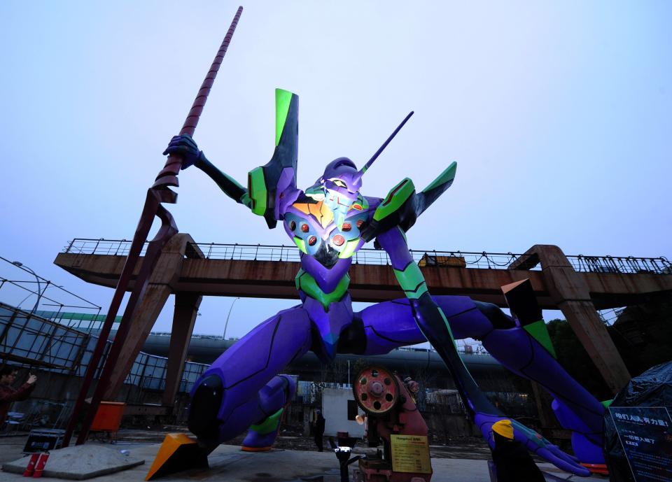 A 25.06-meter-high statue of Shinji’s Eva, Unit 01, in Shanghai - Credit: Hai Xin/ Xinhua News Agency / Getty Ima