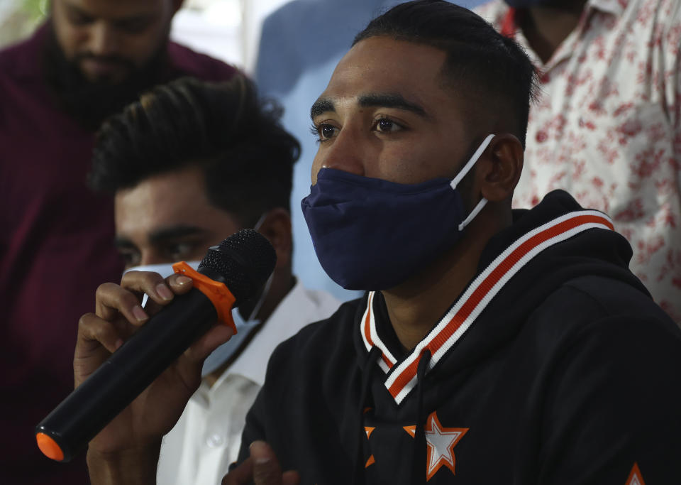 Indian cricketer Mohammed Siraj addressing media at his residence in Hyderabad, India, Thursday, Jan. 21, 2021. (AP Photo/Mahesh Kumar A.)