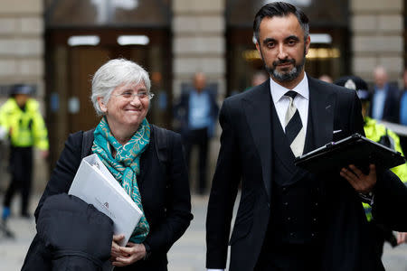 Catalunya's former Education Minister Clara Ponsati and her lawyer Aamer Anwar leave court after a preliminary hearing was held for her extradition at the Sheriff Court in Edinburgh, Scotland, April 12, 2018. REUTERS/Russell Cheyne