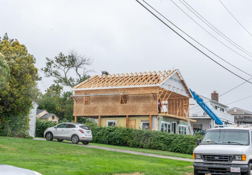 New construction on Desano Street near Scarborough Beach in Narragansett. The University of Rhode Island, many of whose upperclassmen live in Narragansett, is experiencing a housing crisis. Eight hundred students were waiting to find on-campus rooms this spring.