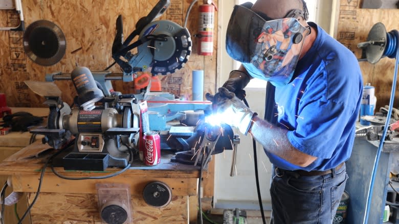 Scavenged from the ashes: Fort McMurray carpenter creates wildfire-charred furniture