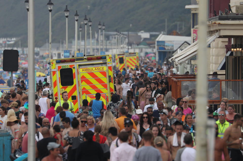 Emergency services make their way along the seafront on Bournemouth beach. Bournemouth Council has appealed for visitors to stay away during the heatwave.
