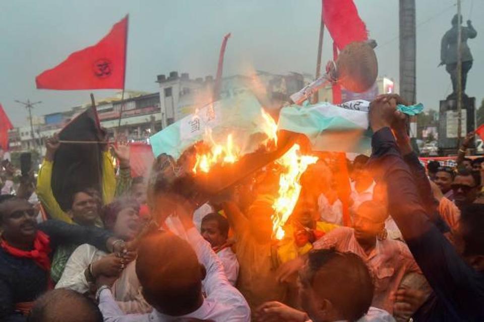 Activists and supporters of Vishwa Hindu Parishad (VHP) take part in a demonstration against the communal clashes in India’s Haryana state, during a protest in Prayagraj on 2 August 2023 (AFP via Getty Images)