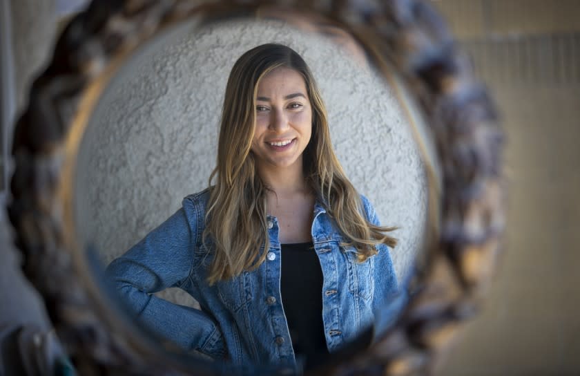 WESTMINSTER, CA -- FRIDAY, MAY 8, 2020: After nearly six years waiting for a kidney transplant, Amar Abu-Samrah, 24, shown at her parents' Westminster home, found out late last year that she was near the top of the list. In mid-March, the coronavirus outbreak forced the transplant center to postpone most procedures. Photo taken in Westminster, CA, on May 8, 2020. Since then, Abu-Samrah has been trying to limit her potential for exposure to the novel coronavirus as much as possible: She's doing more doctor appointments over the phone and avoiding hospital waiting rooms when she goes in for lab work. The Westminster resident, who lives with her parents, is even limiting contact with family members to mealtimes, knowing her kidney failure puts her at high risk if she contracts COVID-19. "It makes me anxious," she said. "I'm like, OK, how much longer do I have to wait?" (Allen J. Schaben / Los Angeles Times)