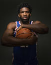 Philadelphia 76ers' Joel Embiid, of Cameroon, poses for a photograph during media day at the NBA basketball team's practice facility, Friday, Sept. 21, 2018, in Camden. (AP Photo/Chris Szagola)