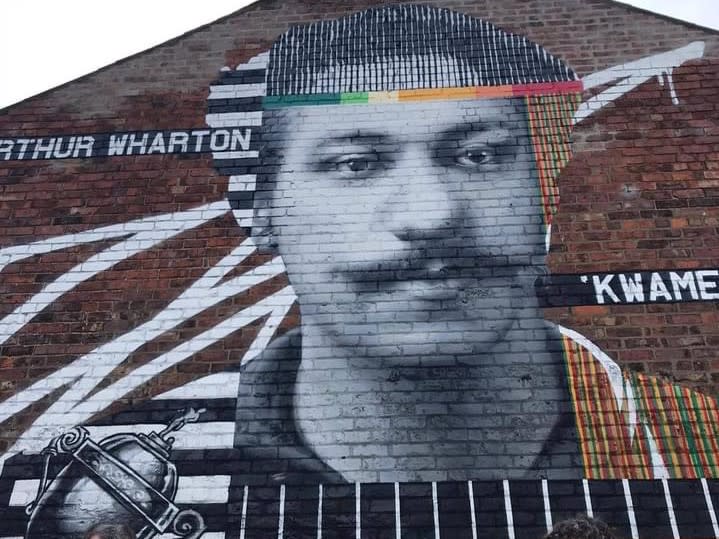 The street mural in Darlington also bears the name Wharton’s Ghanaian family knew him by, KwameArthur Wharton Foundation