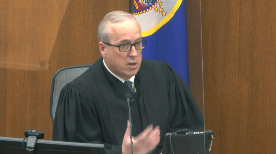 In this image from video, Hennepin County Judge Peter Cahill reads instructions to the jury before closing arguments, Monday, April 19, 2021, in the trial of former Minneapolis police officer Derek Chauvin at the Hennepin County Courthouse in Minneapolis. Chauvin is charged in the May 25, 2020 death of George Floyd. (Court TV via AP, Pool)