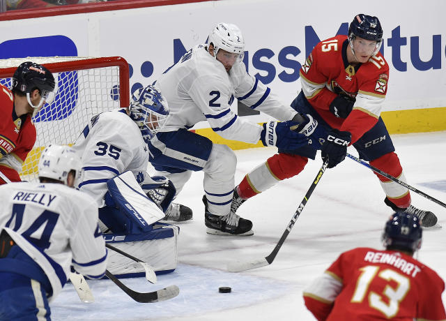 Florida Panthers center Anton Lundell (15) tries to score against Toronto Maple Leafs goaltender Ilya Samsonov (35) during the first period of Game 3 of an NHL hockey Stanley Cup second-round playoff series, Sunday, May 7, 2023, in Sunrise, Fla. (AP Photo/Michael Laughlin)