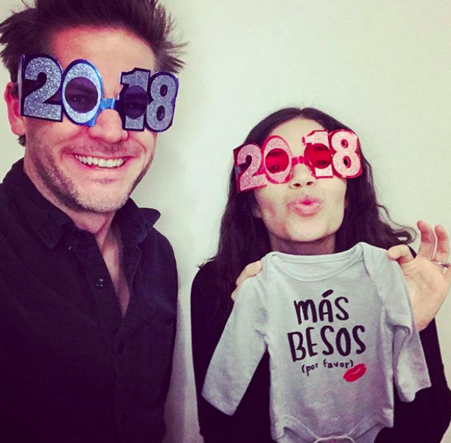 <p>The actress/activist and her husband, actor and director Ryan Piers Williams, took to Instagram to make it official: They’re expecting! “We’re welcoming one more face to kiss in 2018,” Ferrara wrote alongside a photo in which she’s holding a onesie that reads, “Mas Besos (Por Favor).” Translation? More kisses, please! (Photo: <a rel="nofollow noopener" href="https://www.instagram.com/p/BdYzBNLDeta/?hl=en&taken-by=americaferrera" target="_blank" data-ylk="slk:America Ferrera via Instagram;elm:context_link;itc:0;sec:content-canvas" class="link ">America Ferrera via Instagram</a>) </p>