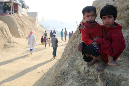 Rohingya refugee children look on at the Jamtoli camp in the morning in Cox's Bazar, Bangladesh, January 22, 2018. REUTERS/Mohammad Ponir Hossain