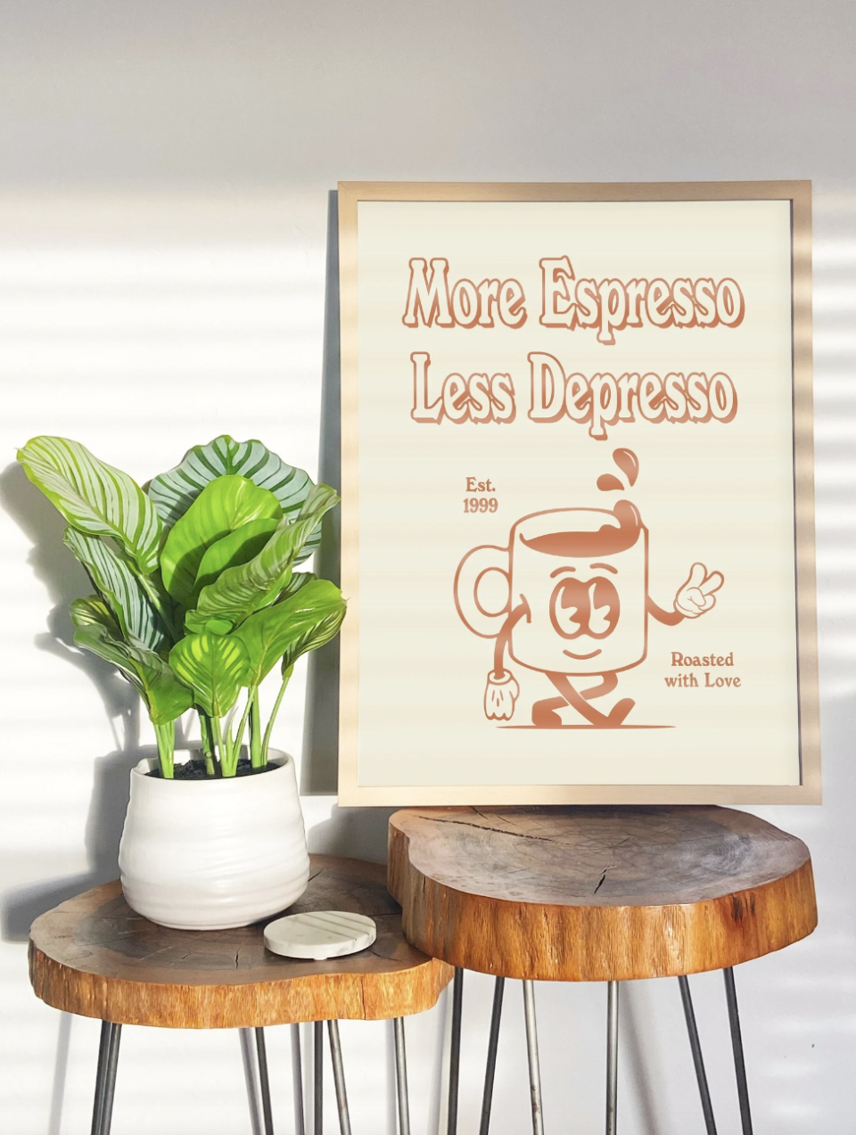 Downloadable Retro Wall Print. more espresso less depresso art print next to plant on wooden table (Photo via Etsy)