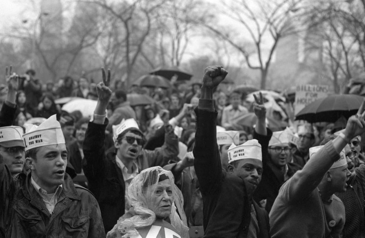 Anti-Vietnam War demonstrators raise their fists during a rally in New York on April 27, 1968. <a href="https://www.gettyimages.com/detail/news-photo/view-of-a-demonstrators-many-with-raised-fists-and-v-signs-news-photo/939585780?adppopup=true" rel="nofollow noopener" target="_blank" data-ylk="slk:Bev Grant/Getty Images;elm:context_link;itc:0;sec:content-canvas" class="link "> Bev Grant/Getty Images</a>