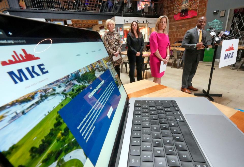 The Vendor Connection website is shown as Milwaukee Mayor Cavalier Johnson (right), along with MKE 2024 Host Committee senior adviser and chief of staff Alison Prange (second right), Zizzo Marketing Group Founder and CEO Anne Zizzo and CEO of VISIT Milwaukee Peggy Williams-Smith answer questions as part of the MKE24 Host Committee Launch of Vendor Connection at Sherman Phoenix Marketplace in Milwaukee.