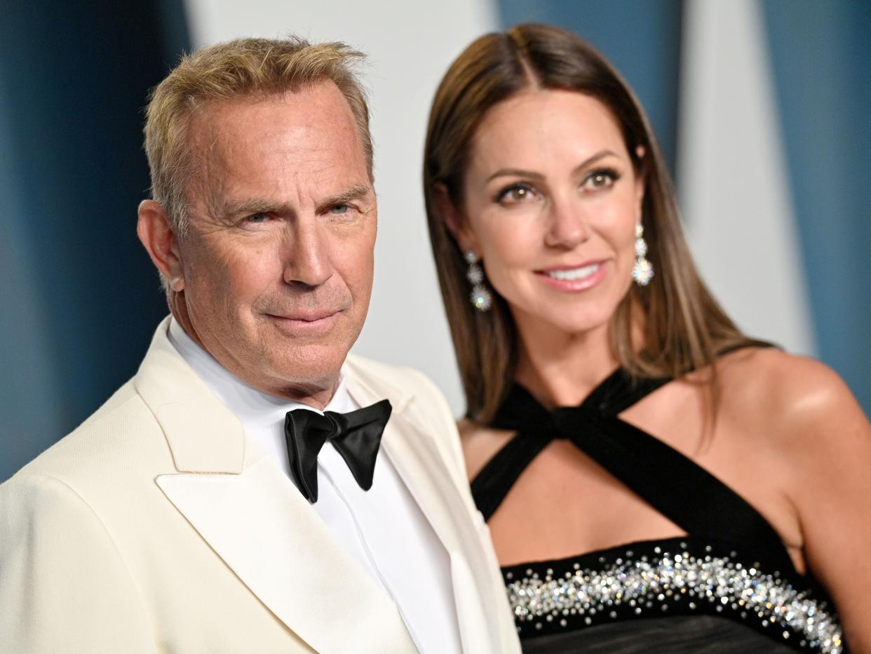 Kevin Costner and Christine Baumgartner attend the 2022 Vanity Fair Oscar Party hosted by Radhika Jones at Wallis Annenberg Center for the Performing Arts on March 27, 2022 in Beverly Hills, California.