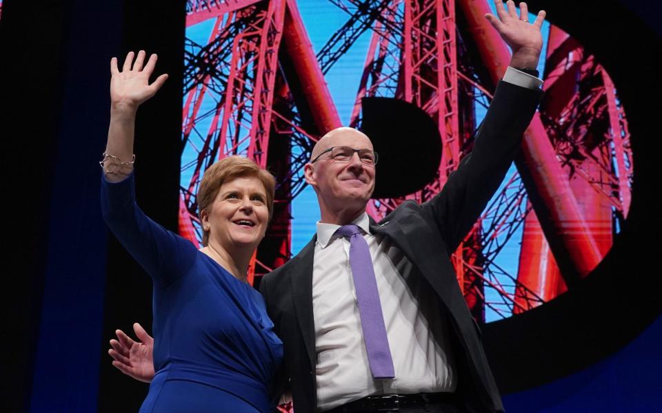 Nicola Sturgeon alongside John Swinney in Aberdeen in 2022