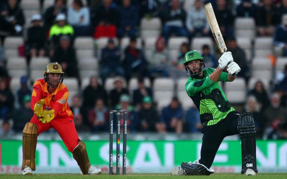 James Vince of Southern Brave hits out while Birmingham Phoenix keeper Chris Cooke looks on during The Hundred match between Southern Brave Men and Birmingham Phoenix Men at The Ageas Bowl on July 30, 2021 in Southampton, England - GETTY IMAGES