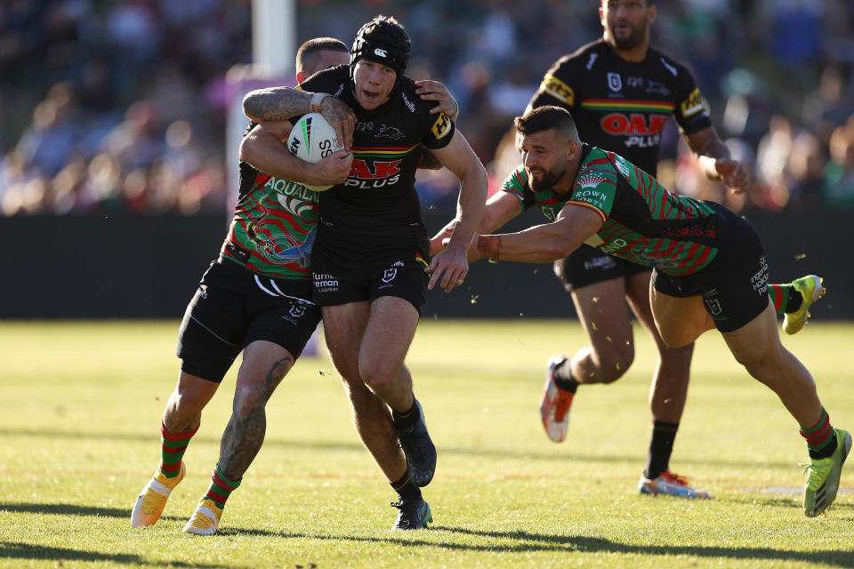 Matt Burton (pictured) is tackled during the round 11 NRL match between the South Sydney Rabbitohs and the Penrith Panthers.