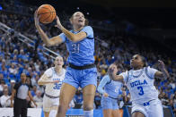 Creighton forward Emma Ronsiek (31) grabs a high pass over UCLA guard Londynn Jones (3) during the first half of a second-round college basketball game in the women's NCAA Tournament Monday, March 25, 2024, in Los Angeles. (AP Photo/Marcio Jose Sanchez)