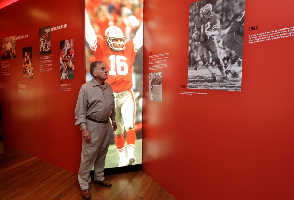 Retired San Francisco 49ers General Manager John McVay looks at photos at the Preview Center in Santa Clara, Calif., Tuesday, Sept. 27, 2011.