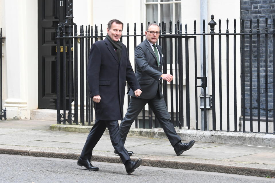 Foreign secretary Jeremy Hunt (left) and National Security Adviser Mark Sedwill arrive in Downing Street, London, for a cabinet meeting.