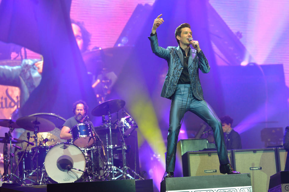 GLASTONBURY, ENGLAND - JUNE 29:   Brandon Flowers of The Killers performs live on the Pyramid stage during day four of Glastonbury Festival at Worthy Farm, Pilton on June 29, 2019 in Glastonbury, England. The festival, founded by farmer Michael Eavis in 1970, is the largest greenfield music and performing arts festival in the world. Tickets for the festival sold out in just 36 minutes as it returns following a fallow year. (Photo by Jim Dyson/Getty Images)