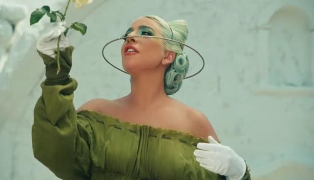 Lady Gaga wears latex, lace and metal masks in new '911' music video