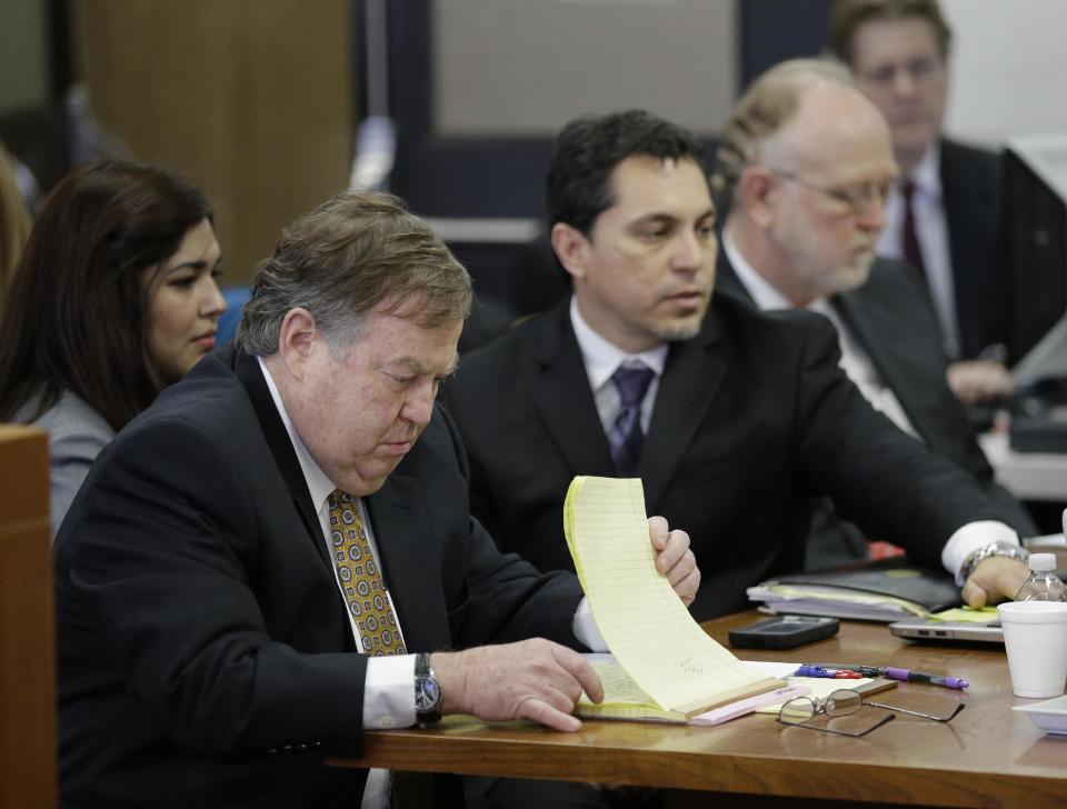 Plaintiff attorney Richard Gray looks over his notes as he prepares to makes his closing arguments in the second phase of Texas' school finance trial before State District Judge John Dietz, Friday, Feb. 7, 2014, in Austin, Texas. (AP Photo/Eric Gay)