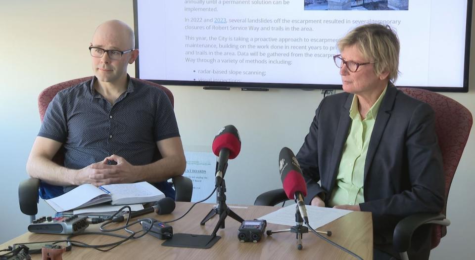 Taylor Eshpeter, manager of engineering services for the City of Whitehorse, alongside Mayor Laura Cabott at a news conference, March 21, 2024.