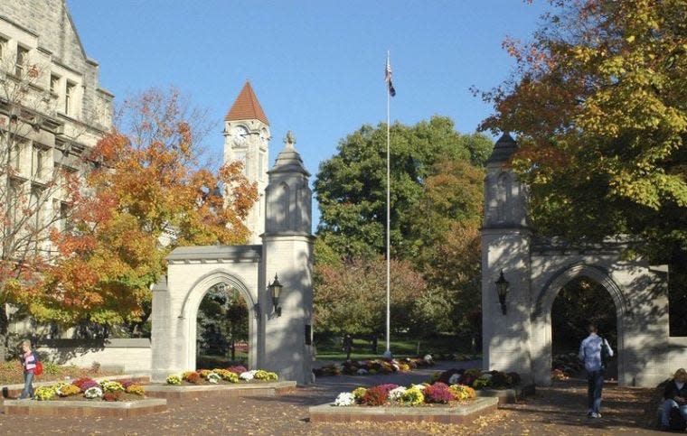 Indiana University’s wooded campus, limestone buildings and iconic features such as the Sample Gates, above, create an ambiance that is one of the many selling points of the university.