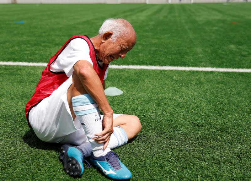 FILE PHOTO: The Wider Image: For Japan's ageing soccer players, 80 is the new 50