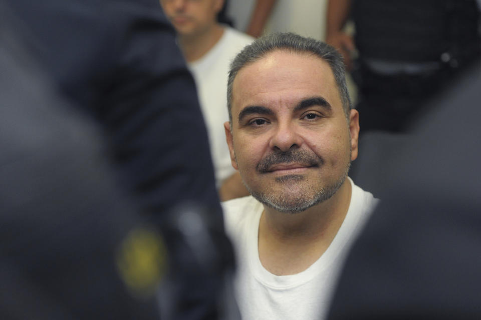 FILE - In this Aug. 8, 2018 file photo, El Salvador's former President Tony Saca attends a hearing at the Isidro Menendez Judicial Complex in San Salvador, El Salvador. Saca who became president of El Salvador with the right-wing Nationalist Republican Alliance, ARENA, party, was charged and convicted of embezzling public funds. (AP Photo/Salvador Melendez, File)