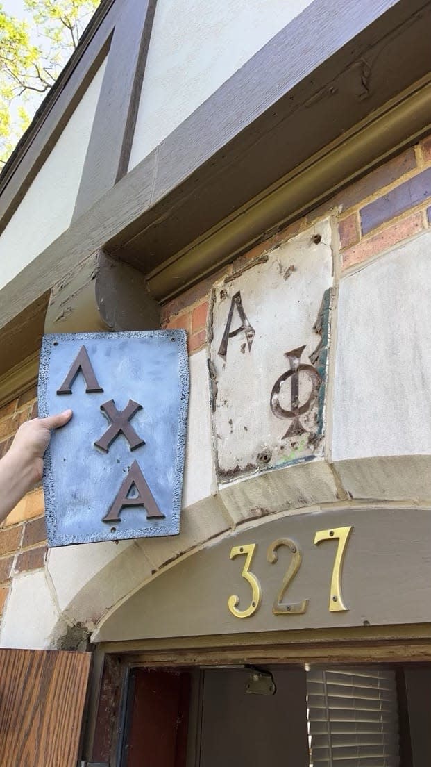 Lambda Chi Alpha's bronze letters (left) were removed at the old house to reveal the original Alpha Phi sorority letters above the front door. This keystone will be preserved and presented to the sorority during Dakota Days.