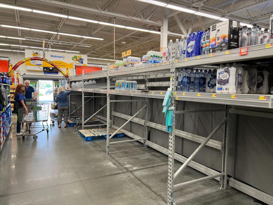 The shelves holding water at this Walmart Neighborhood in Market in Northeast Cape Coral are almost emptying. There is a run on supplies with a hurricane in the forecast for Southwest Florida next week.
