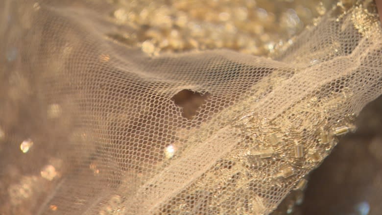 Bride devastated after $4K wedding dress arrives with holes, frayed edges