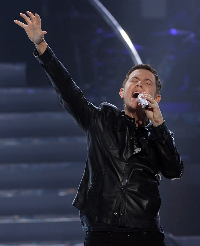 Scotty McCreery performs onstage during Fox's "American Idol" finale results show held at Nokia Theatre LA Live on May 25, 2011.<p>Kevin Winter/American Idol 2011/Getty Images</p>
