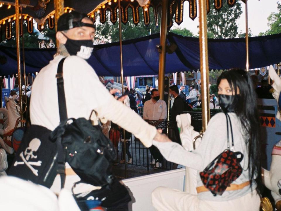 Kourtney Kardashian and Travis Barker at Disneyland