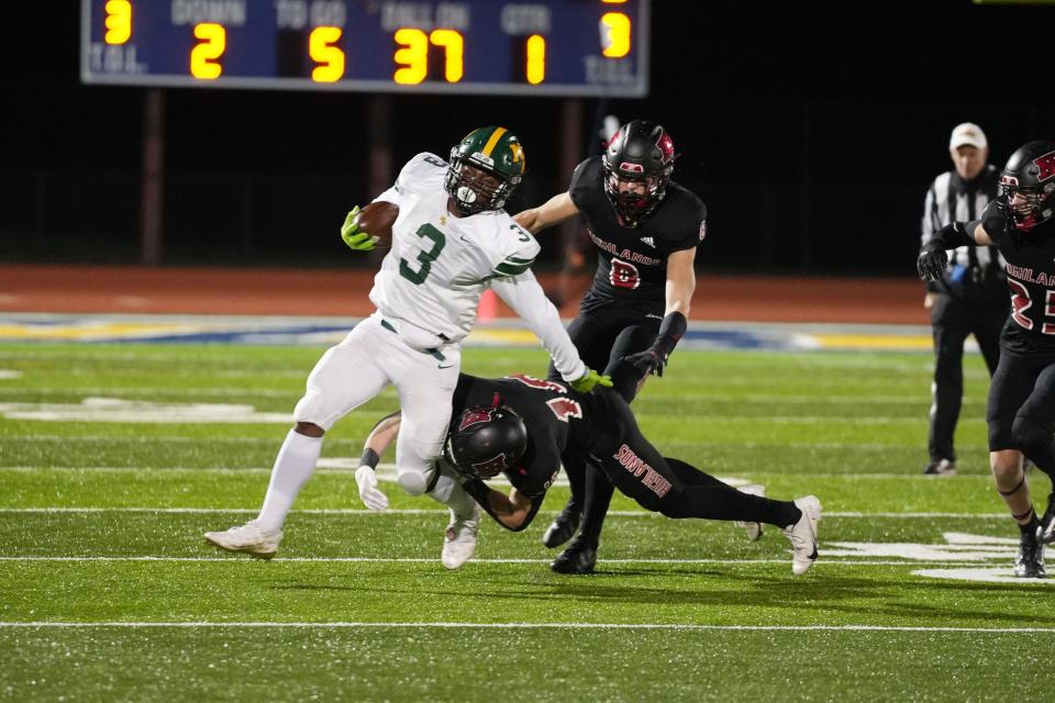 Northern Highlands vs. North Hunterdon in a Group 4 football semifinal at Franklin High School in Franklin Township on Saturday, November 19, 2022. North Hunterdon #3 Kente Edwards avoids a tackle. 