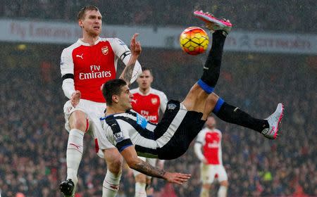 Football Soccer - Arsenal v Newcastle United - Barclays Premier League - Emirates Stadium - 2/1/16 Newcastle's Aleksandar Mitrovic attempts a overhead kick Reuters / Eddie Keogh Livepic