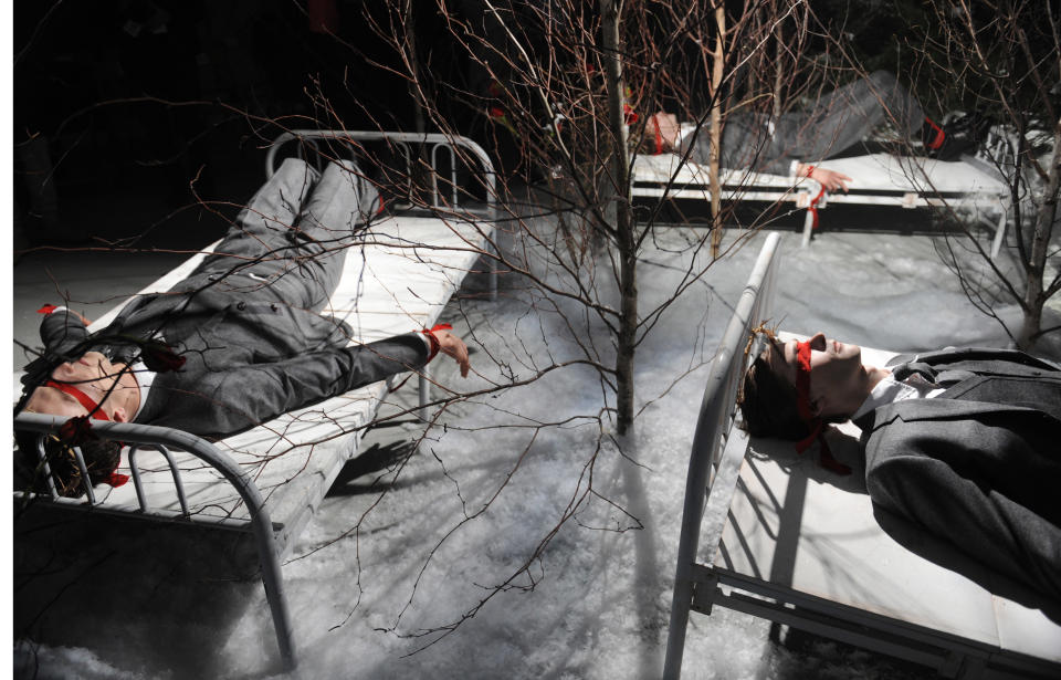 The Thom Browne Fall 2013 collection is modeled during Fashion Week, Monday, Feb. 11, 2013, in New York. (AP Photo/Louis Lanzano)