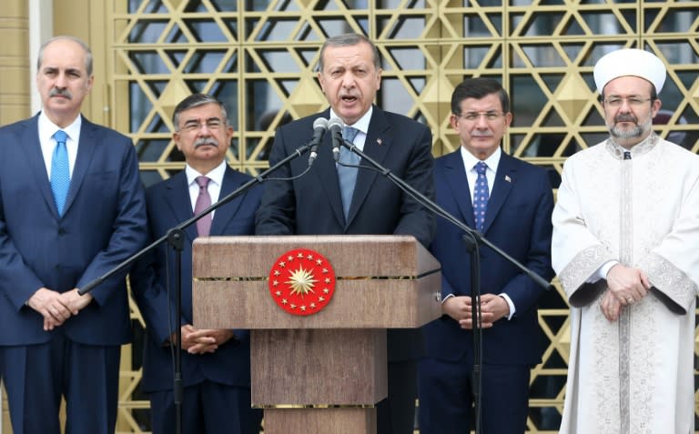 President Recep Tayyip Erdogan delivers a speech during the inauguration of the new Bestepe People's Mosque on the grounds of the presidential palace in Ankara on July 3, 2015