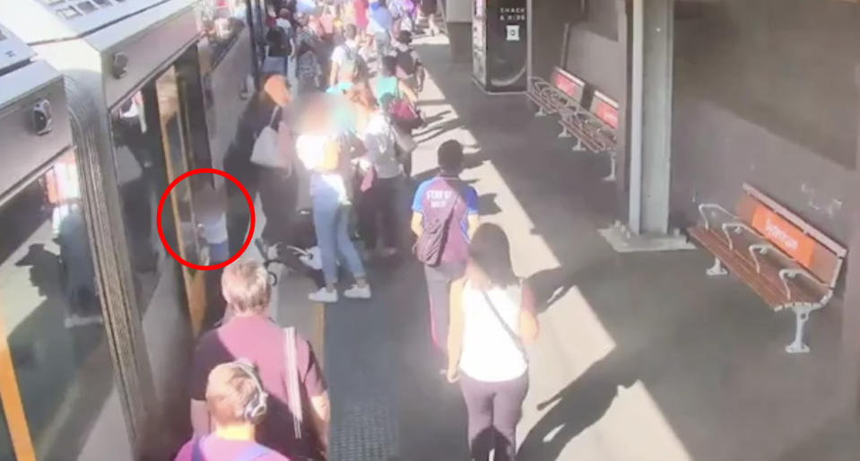 The boy is seen falling between the train and platform at Sydenham station. 