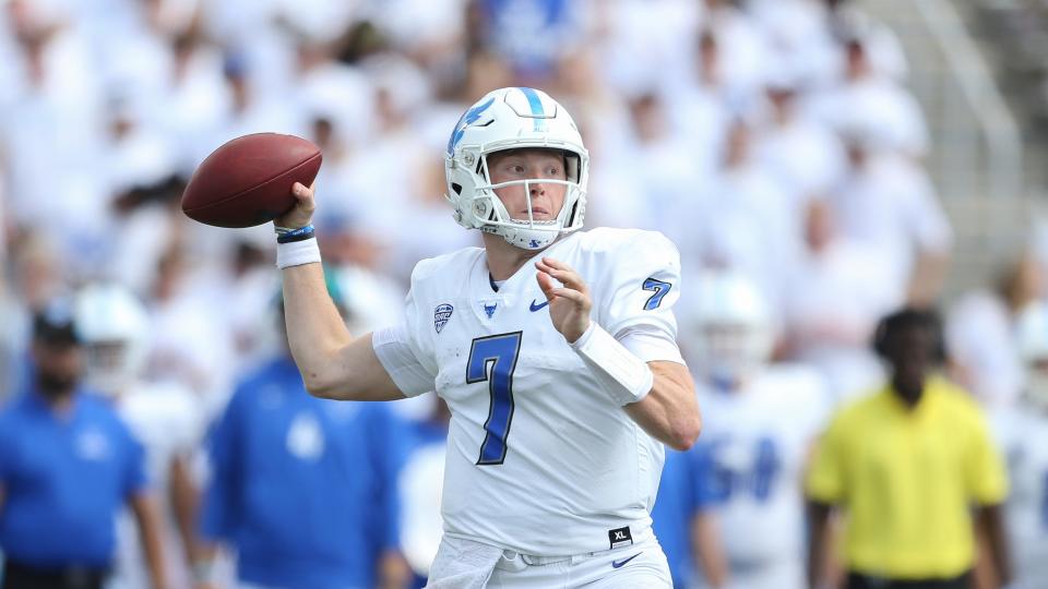 Kyle Vantrease, then a quarterback at Buffalo, looks to pass during a game against Coastal Carolina in Buffalo, N.Y. on Sept. 18, 2021. CCU won 28-25. Vantrease now is a sixth-year player and the starting quarterback at Georgia Southern.