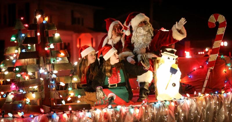 Santa waves to the crowd at the 2019 Christmas in Ida Festival. This year's Parade of Lights is Saturday.
