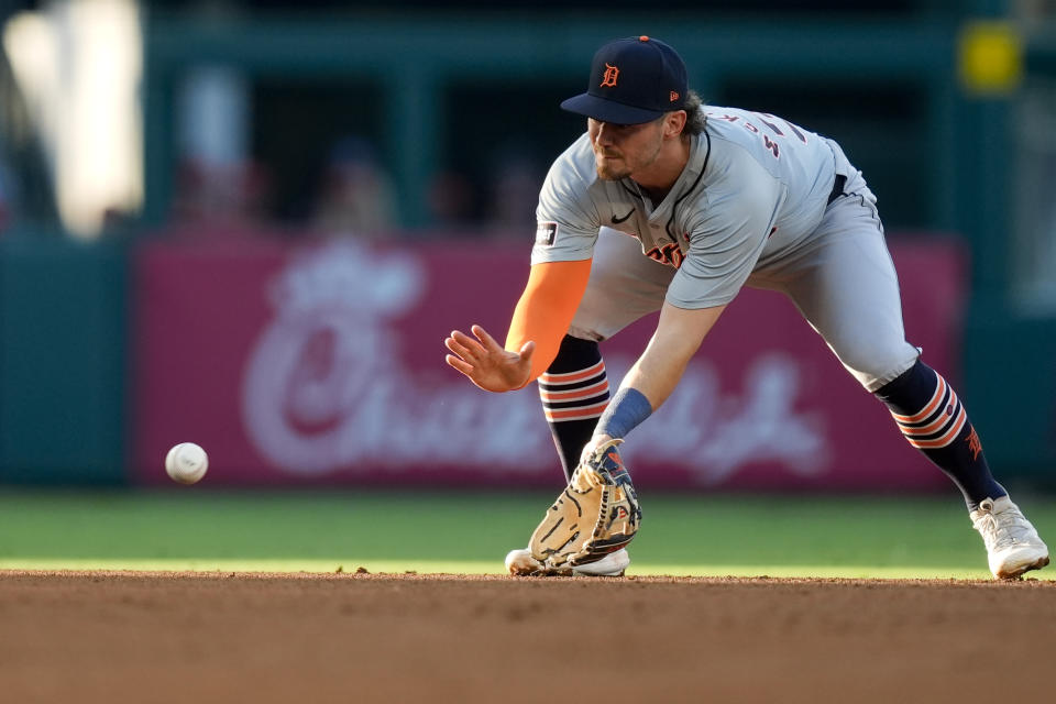 Detroit Tigers shortstop Zach McKinstry fields a ground ball hit by Los Angeles Angels' Luis Rengifo, who was out at first during the third inning of a baseball game, Thursday, June 27, 2024, in Anaheim, Calif. (AP Photo/Ryan Sun)