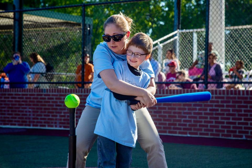 Children got to break in Champions Field at the Gadsden Sports Complex following the ribbon cutting on Monday, April 22, 2024. The facility is the highlight of Phase 3 of the complex, a joint project between the City of Gadsden and Gadsden State Community College, and gives children of all ages with special needs an opportunity to play and compete.