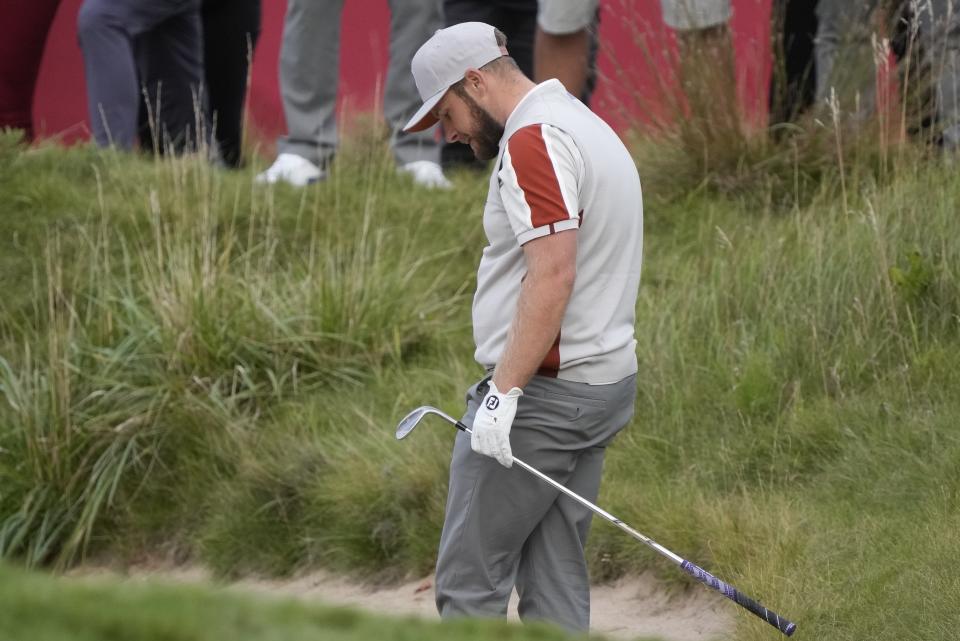 Team Europe's Tyrrell Hatton reacts after his bunker shot on the 18th hole during a four-ball match the Ryder Cup at the Whistling Straits Golf Course Saturday, Sept. 25, 2021, in Sheboygan, Wis. (AP Photo/Charlie Neibergall)