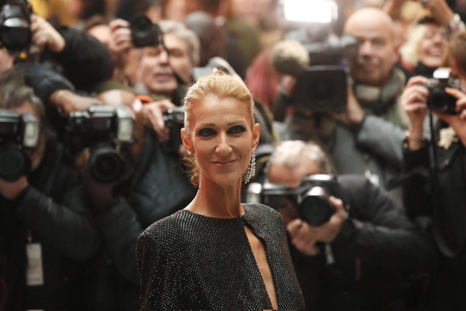 Singer Celine Dion arrives for the Vauthier Spring/Summer 2019 Haute Couture fashion collection presented in Paris, Tuesday Jan. 22, 2019. (AP Photo/Francois Mori)