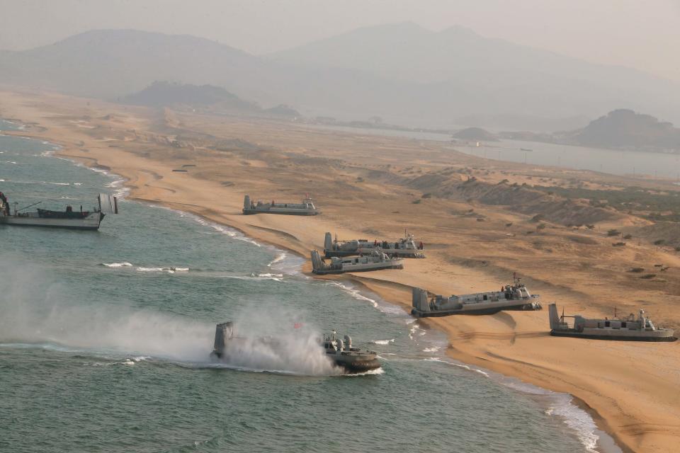 Landing and anti-landing exercises being carried out by the Korean People's Army at an unknown location.