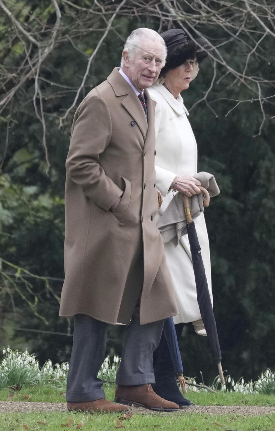 Britain's King Charles III and Queen Camilla arrive to attend a Sunday church service at St Mary Magdalene Church, in Sandringham, Norfolk, England, Sunday, Feb. 11, 2024. (PA via AP)